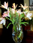 lilies with rosemary sprigs